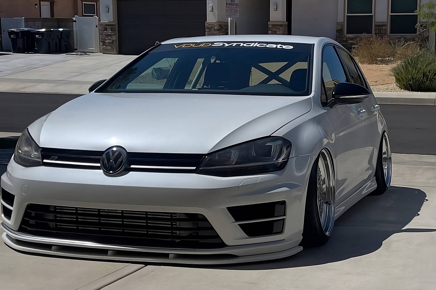 Volkswagen MK7 Golf R with side skirts installed front three quarter view