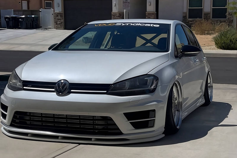 Volkswagen MK7 Golf R with side skirts installed front three quarter view