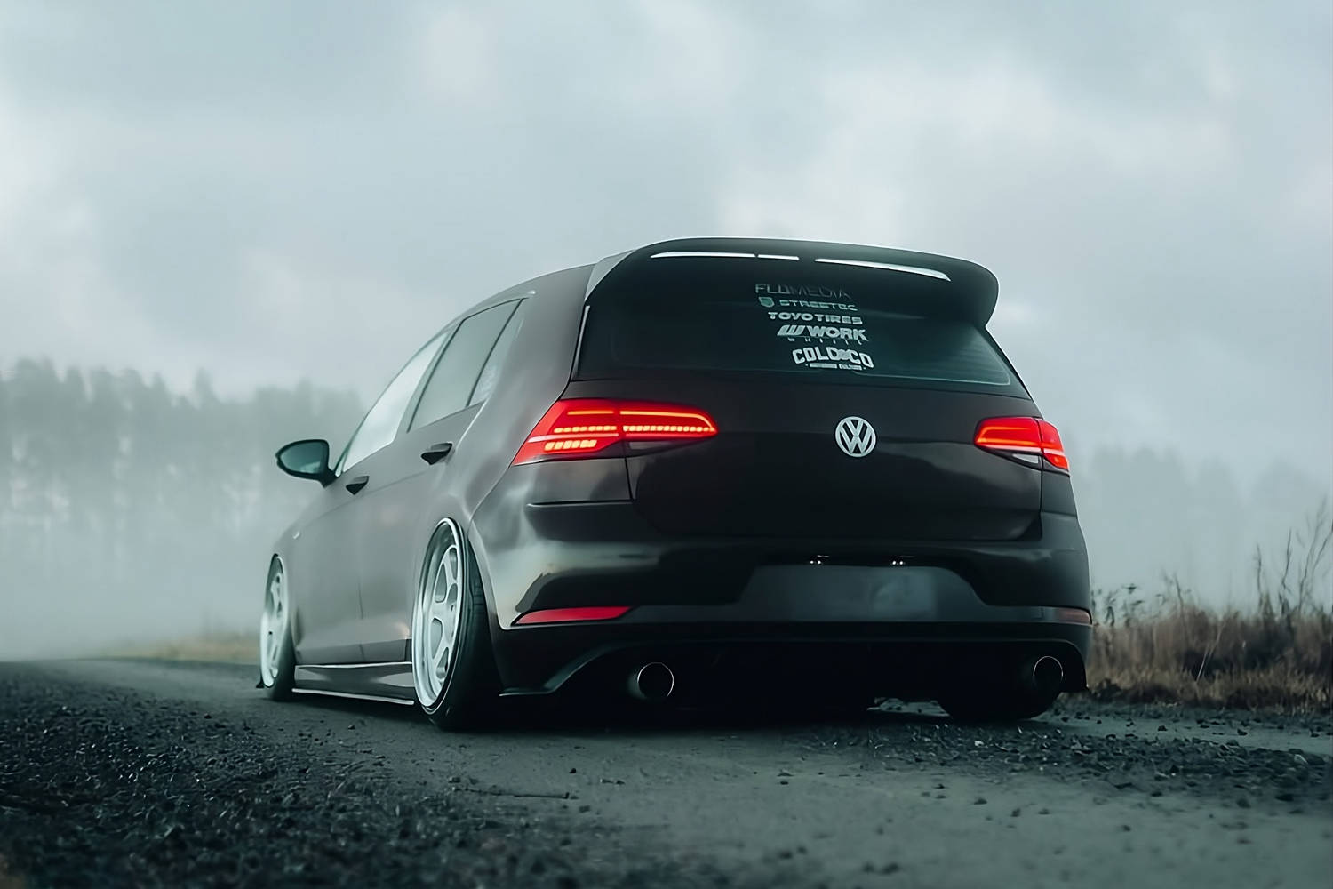 Volkswagen MK7 Golf GTI with Optikwerks side skirts installed, rear view