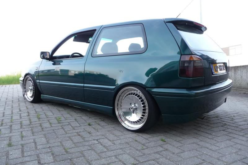 Green VW MK3 Golf with smoothed ABT style side skirts