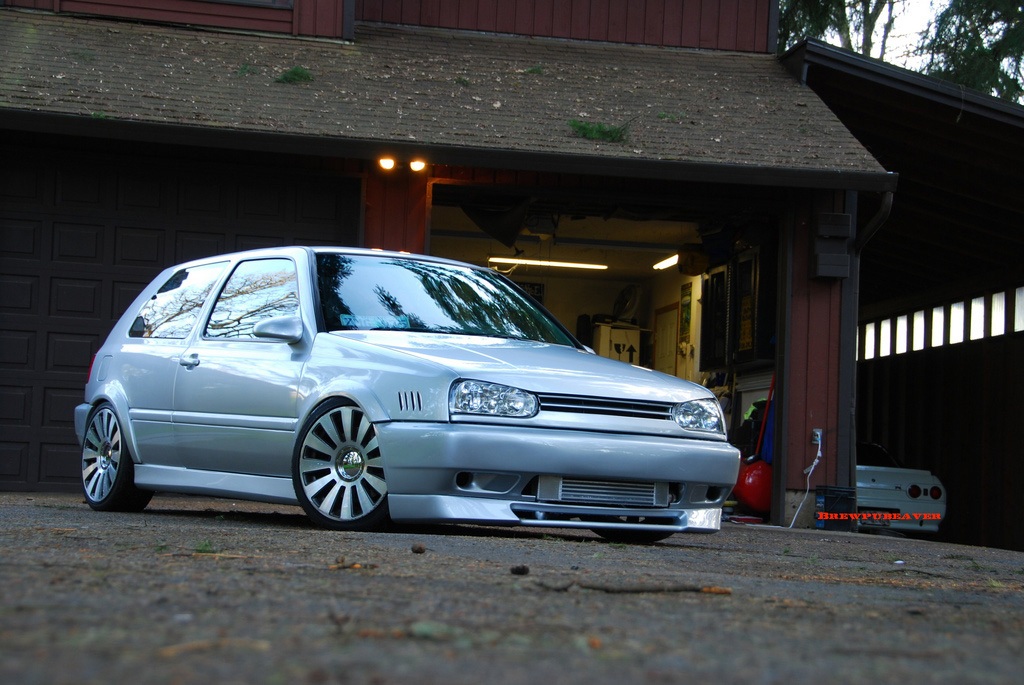 Volkswagen MK3 GTI / Golf with OptikWerks smoothed ABT side skirts installed
