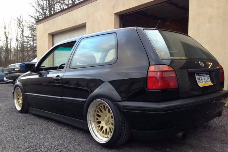 Black Volkswagen MK3 Golf with textured side skirts