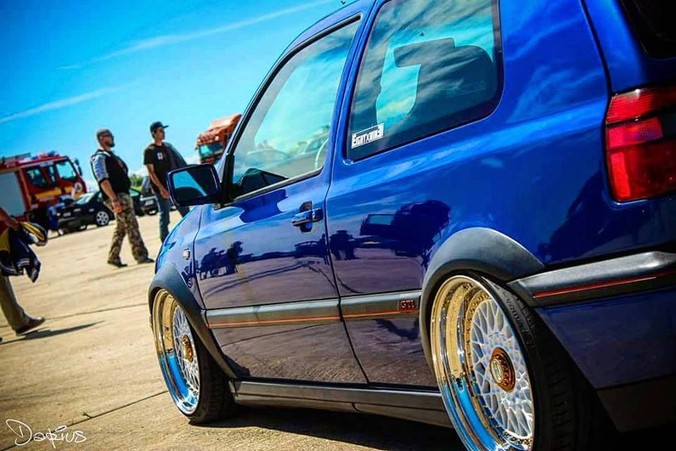 Blue Volkswagen MK3 GTI with OptikWerks widened Euro fender flares