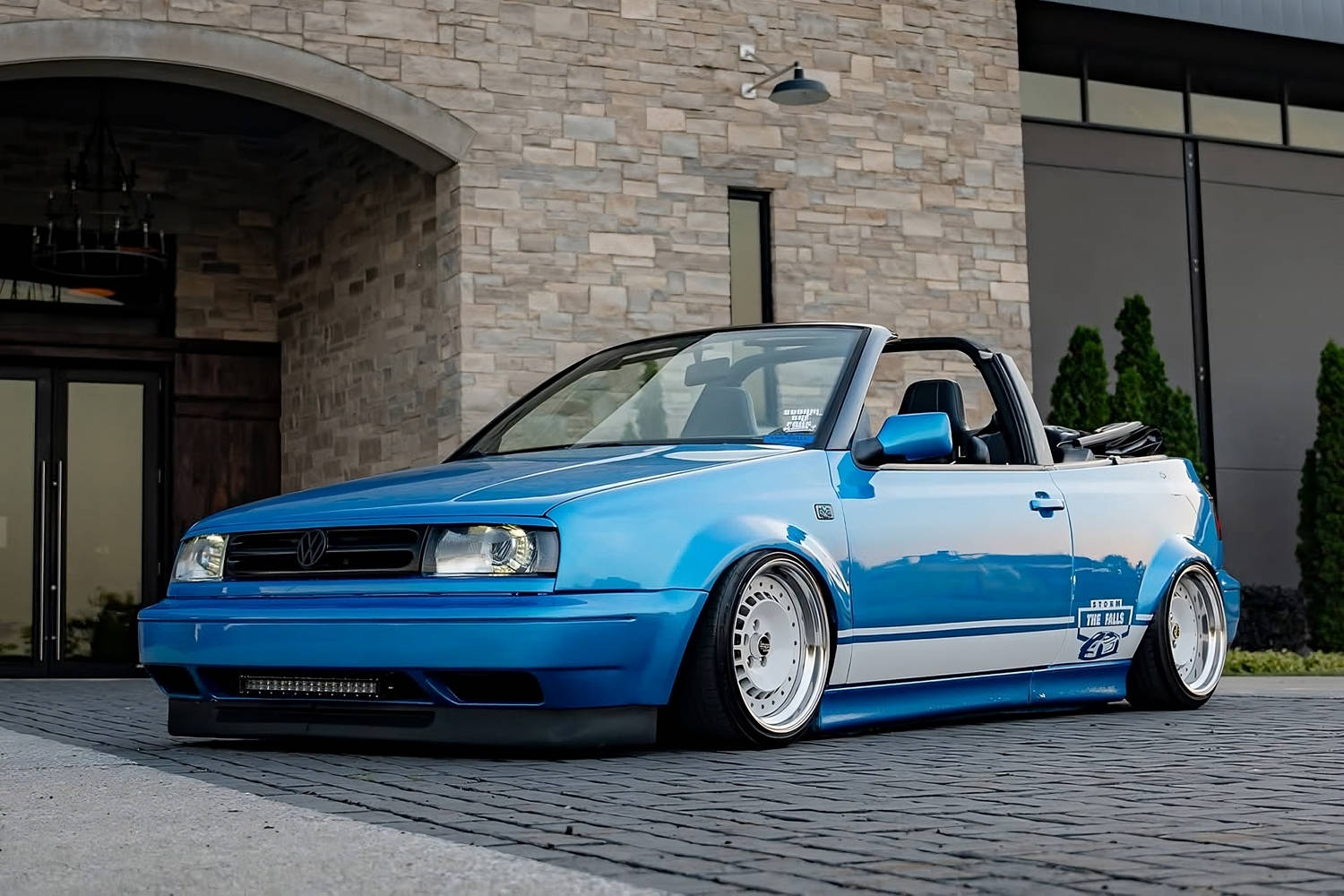 Volkswagen MK3 Cabrio on widebody fender flares and stance wheels by Optikwerks