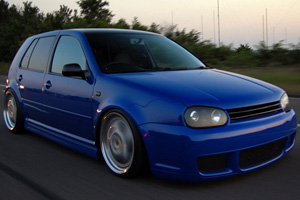 Blue Volkswagen MK4 Golf with R32-style front bumper