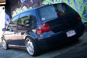 Black Volkswagen MK4 Golf with textured Votex side skirts