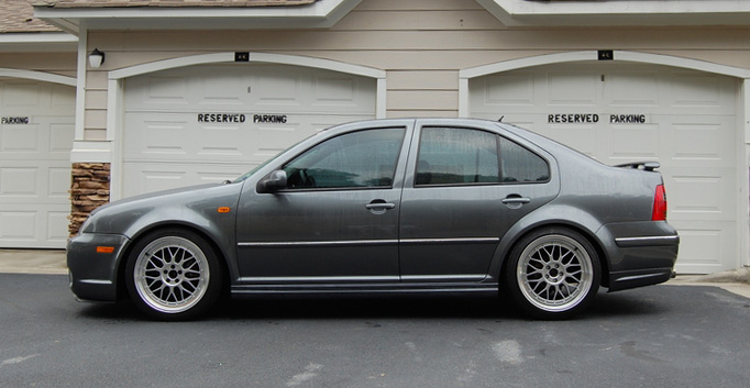 Blue Volkswagen MK4 Jetta with GLI style side skirts