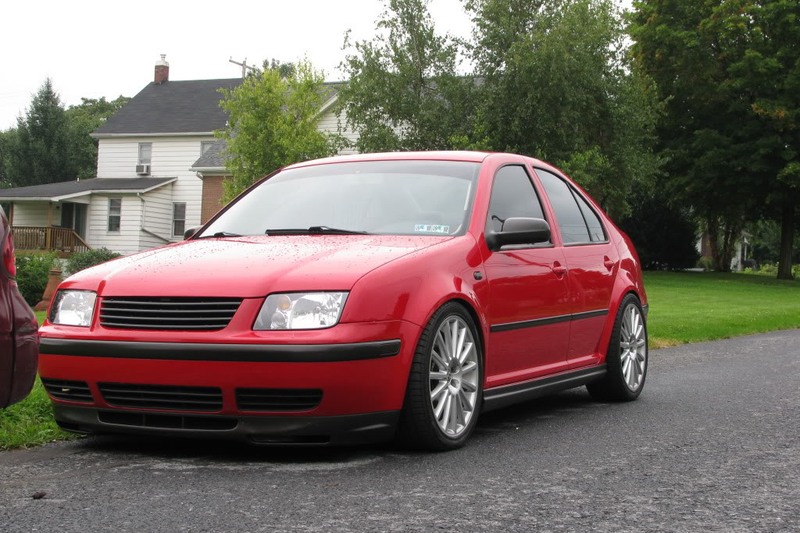 Red VW MK4 Jetta / Bora with textured GLI style side skirts