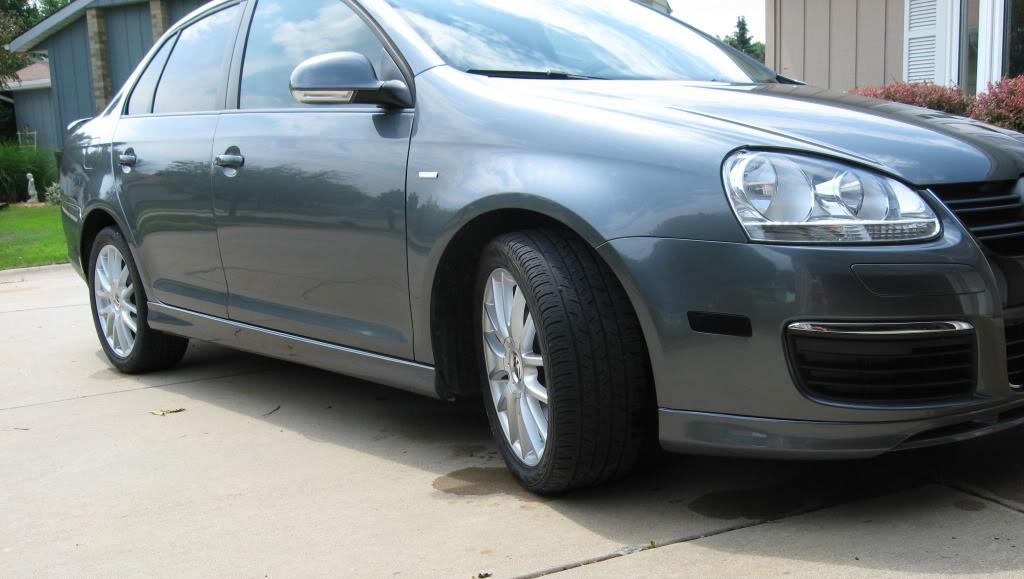 Gray Volkswagen MK5 Jetta side view with Votex style side skirts installed